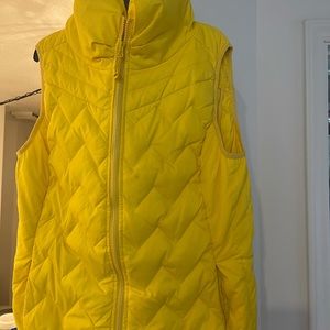 Women, yellow thin vest size XL runs small!